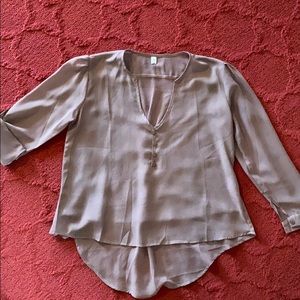 Cute sheer top. Versatile in style.